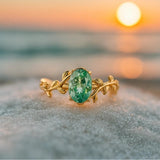 Viento de Esmeralda – Anillo dorado con ágata verde y motivo foliar