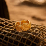 Thasalla | Espirales de Oro